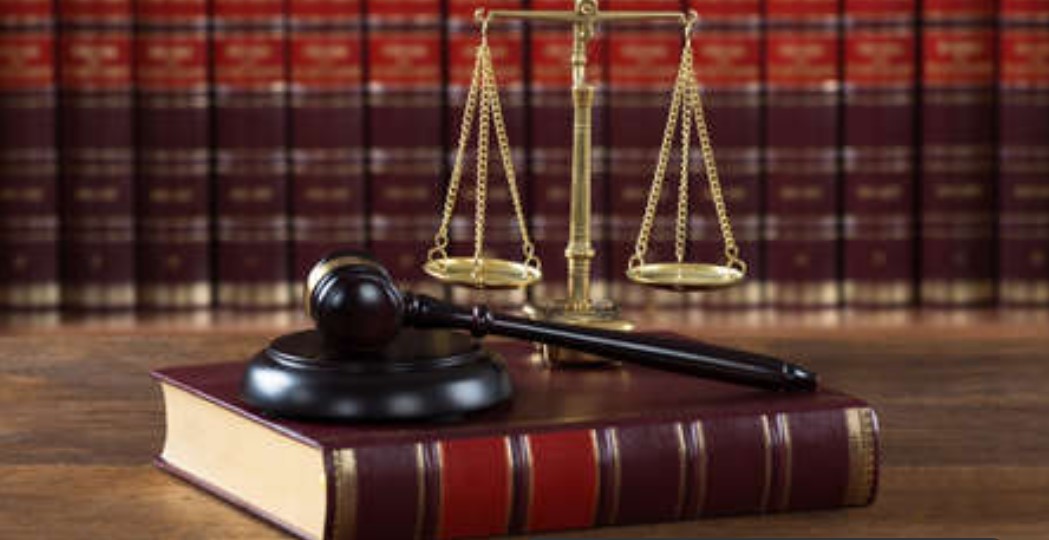 What does French law say about the use of Anglicisms in advertising?